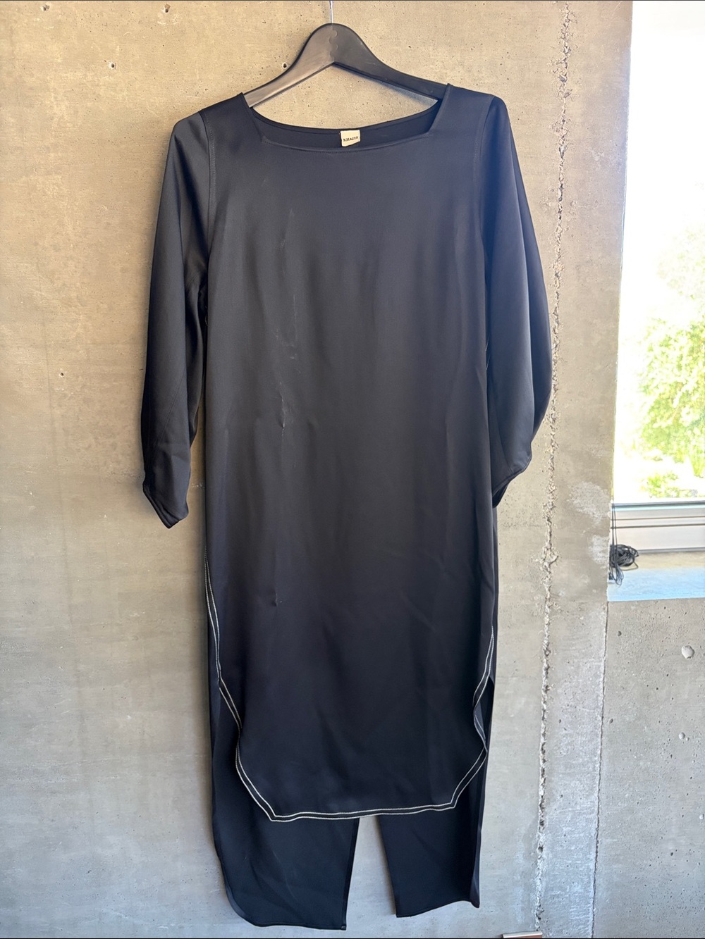 KHAITE Black Long Sleeve Split-Hem Dress with Contrast Stitching